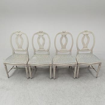 A dining table and four chairs, gustavian style, late 20th century.