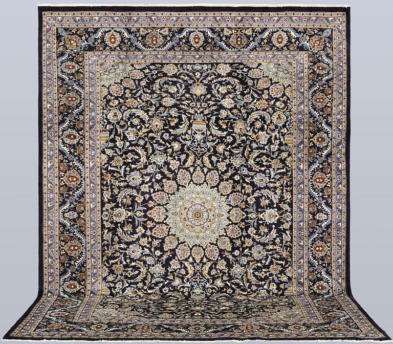A Kashmar carpet, approx. 335 x 248 cm.