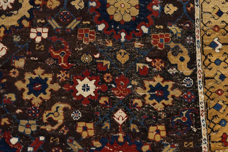 A carpet, fragment, an antique Karabagh 18th century, ca 293-300,5 x 202,5-205,5 cm.