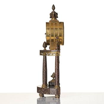 A late Gustavian ormolu and 'Blyberg' porphyry portico clock by E. Engelbrechten (watchmaker in Stockholm 1815-45).
