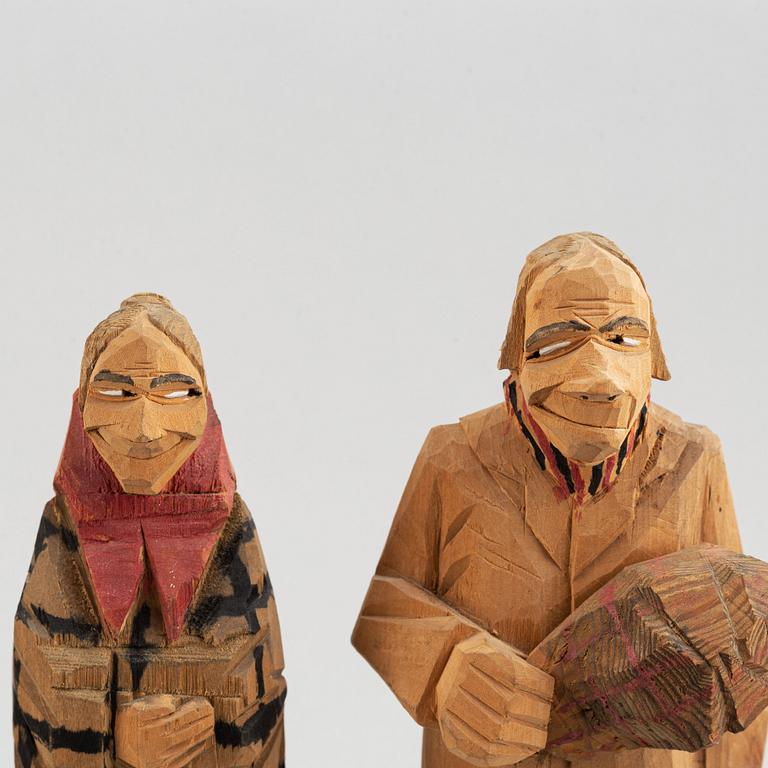 Four Carl Johan Trygg wooden sculptures, two signed and dated 1918.