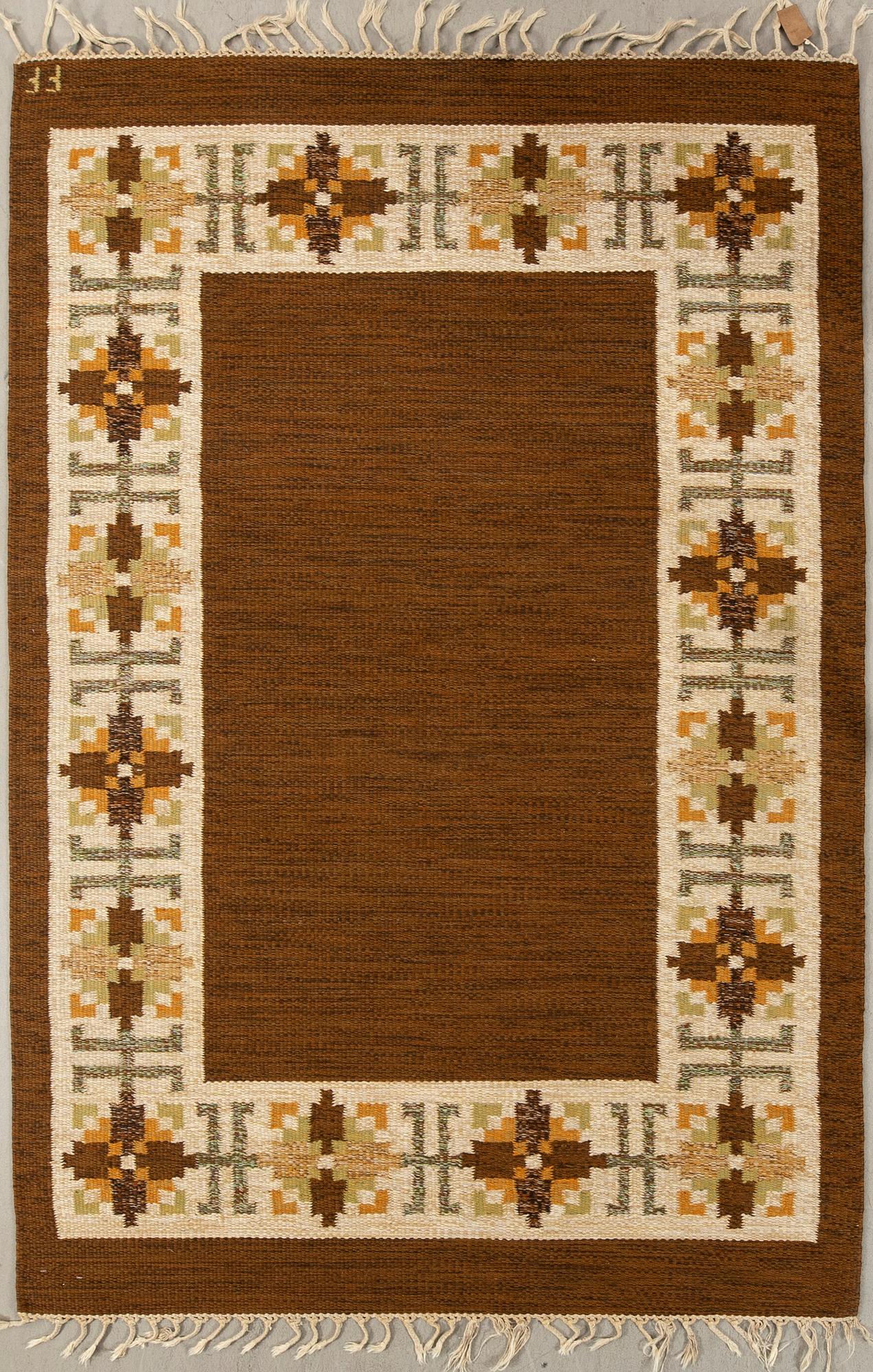 Rug flat weave signed FF (Swedish design: the company AB Fredrik Fiedler) woven in Portugal, approximately 202x136 cm.