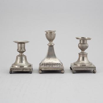 7 pewter candlesticks, 19th Century. (2+2+2+1).