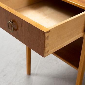 A pair of teak veneered bedside table, mid 20th Century.