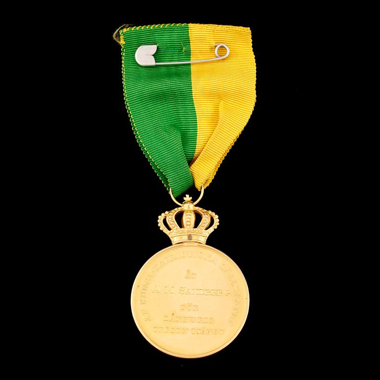 MEDALJ, 1936. 18 k guld. Tot 31 g.