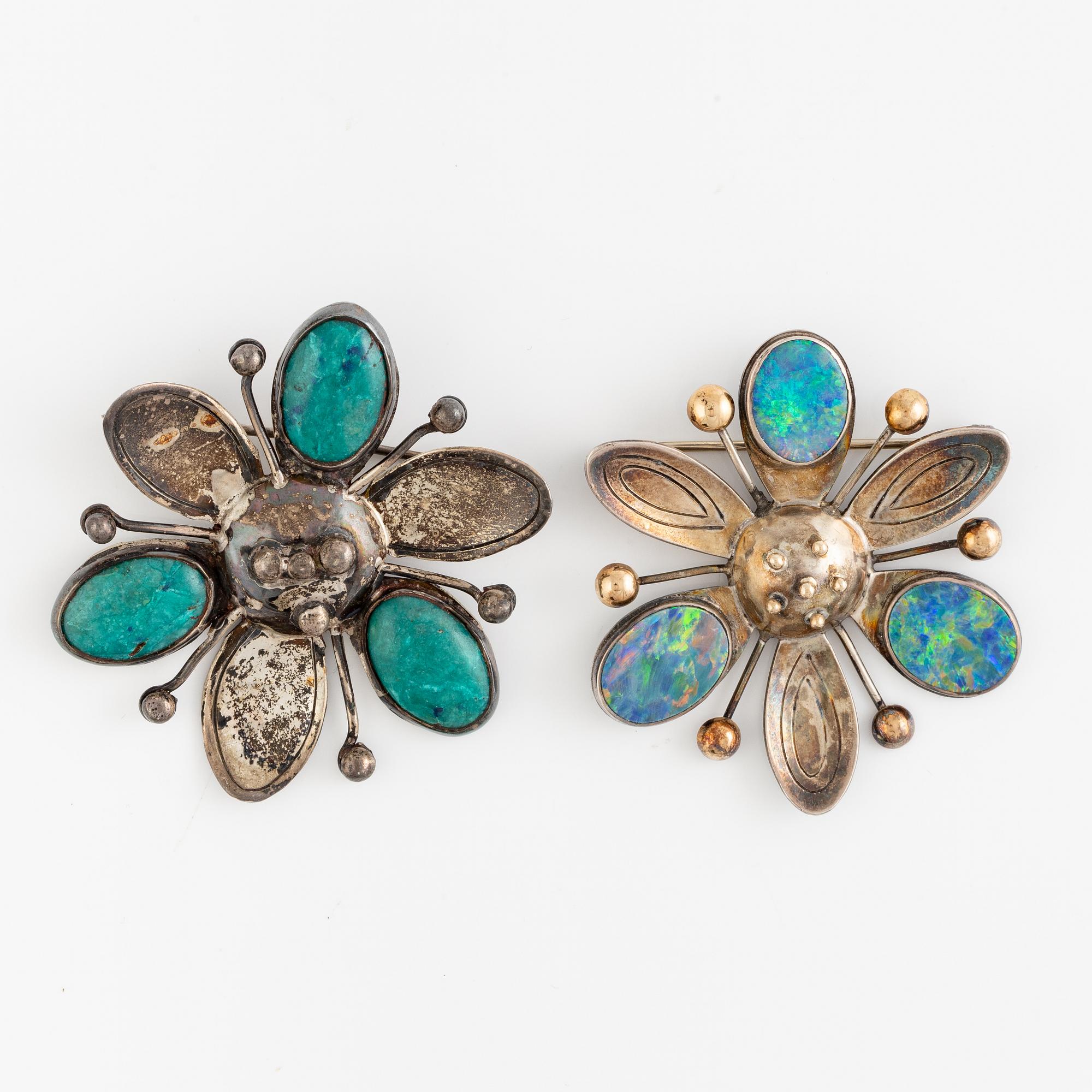 Two brooches, silver, one by Rey Urban, flower-shaped.