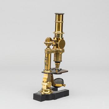 A moncular microscope around 1900.
