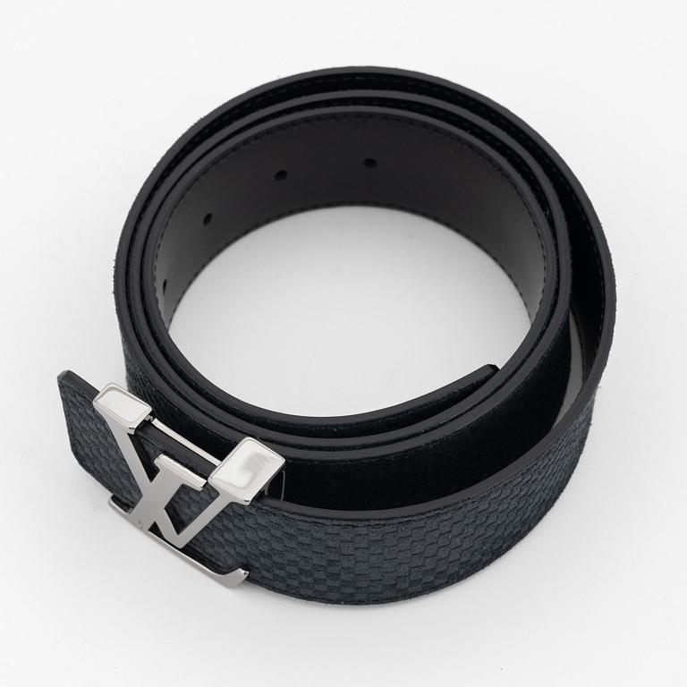 Louis Vuitton, a navy suede 'LV Initiales' belt. size 100, 2012.