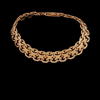 ARMLÄNK, 18k guld, Erik Wahlbeck, Stockholm, 1947. Vikt 38 g.