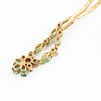 A emerald and brilliant cut diamond necklace.