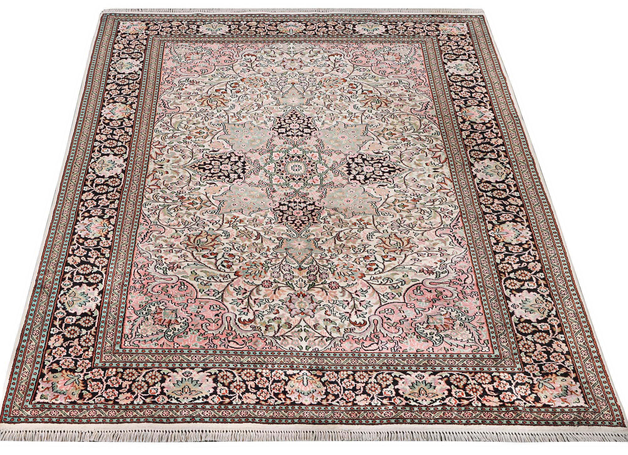 A silk Kashmir carpet, c. 267 x 185 cm.