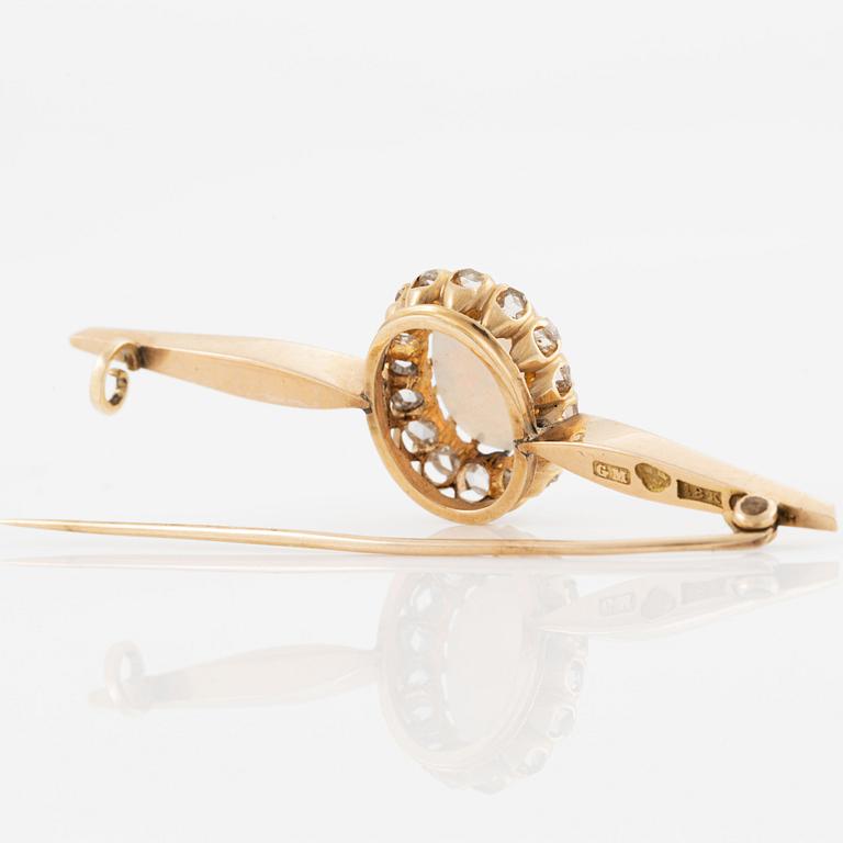Brooch, 18K gold with opal and rose-cut diamonds.