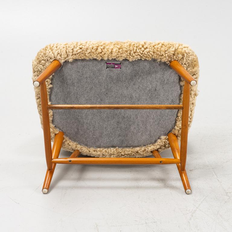 Alf Svensson, a 'TeVe' easy chair, with new sheepskin upholstery. Bra Bohag, Studio Ljungs Industrier, 1950's.