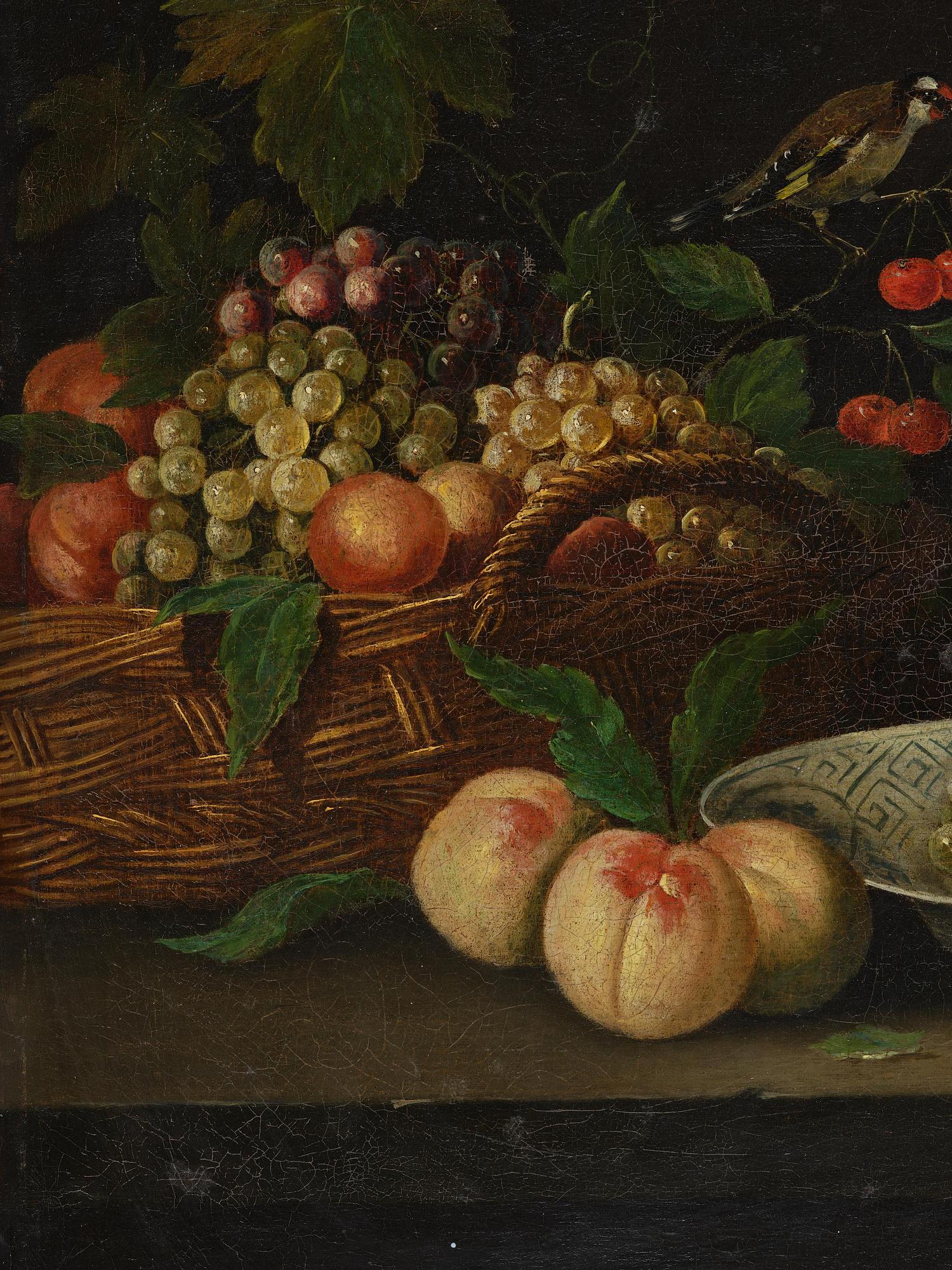 Joris van Son, follower of, Still life with a goldfinch, fruits, and a plate.
