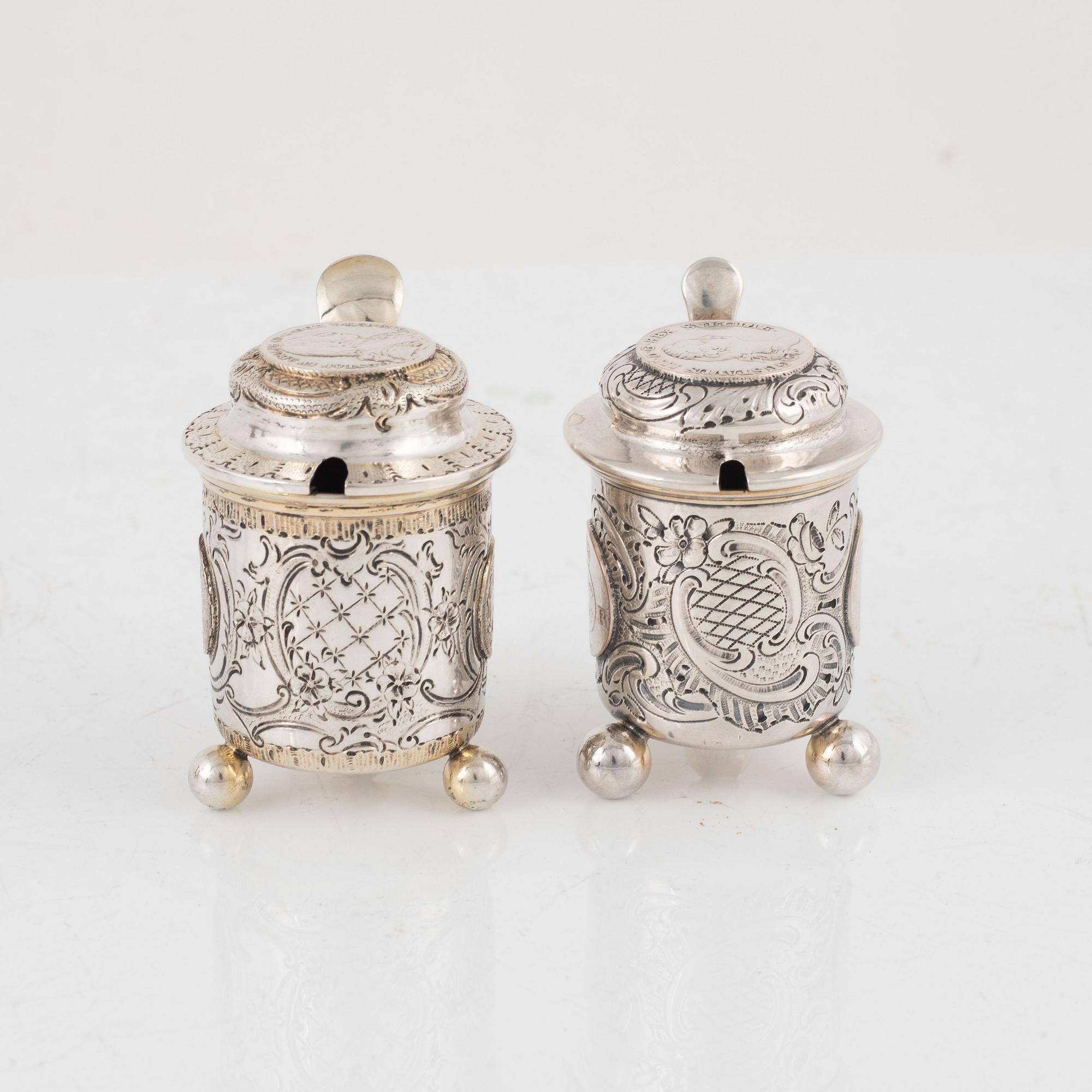 Candlesticks, a pair, Gustaf Möllenborg, Stockholm 1844, and two salt cellars including CG Hallberg, Stockholm 1897.