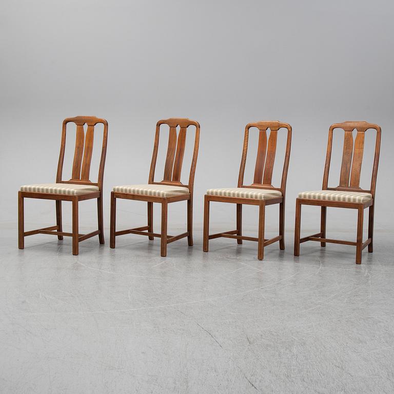 Carl Malmsten, A five-piece walnut 'Ambassadör' dining suite by Carl Malmsten.