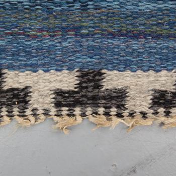 A CARPET, flat weave, atributed to Rakel Carlander, around 306 x 197 cm.