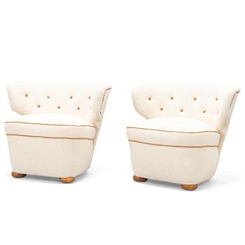 A pair of 1950's armchairs for Oy Pauk Boman Ab.