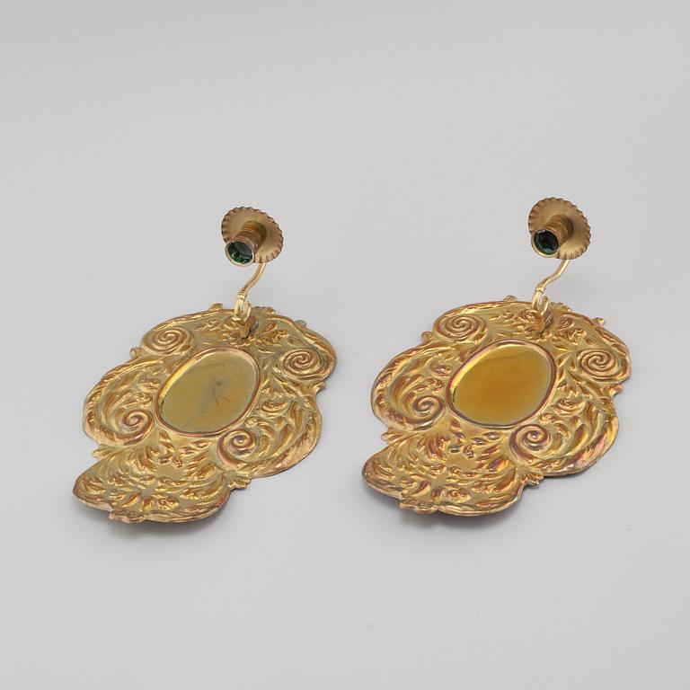 A pair of wallplates made of brass, 20th century.