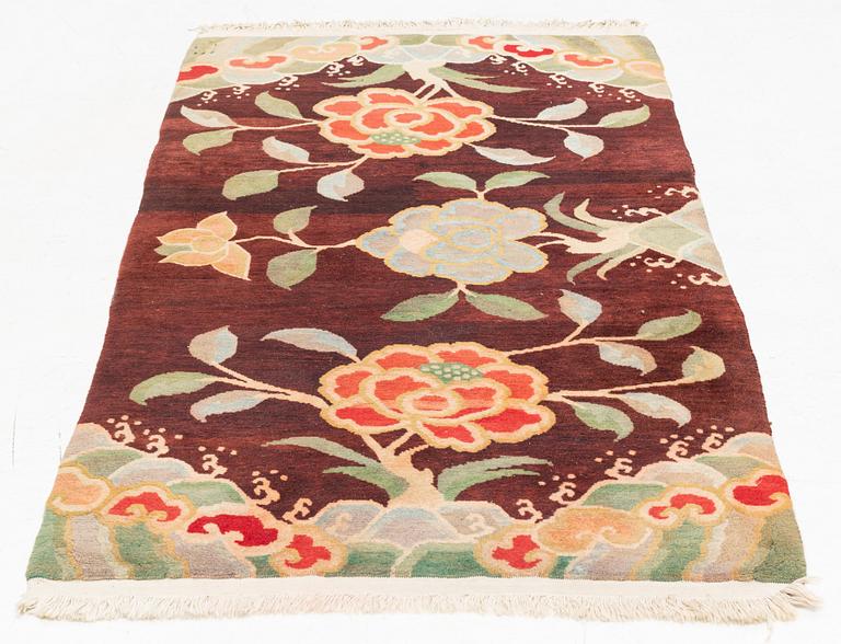 A rug, China, circa 176 x 92 cm.