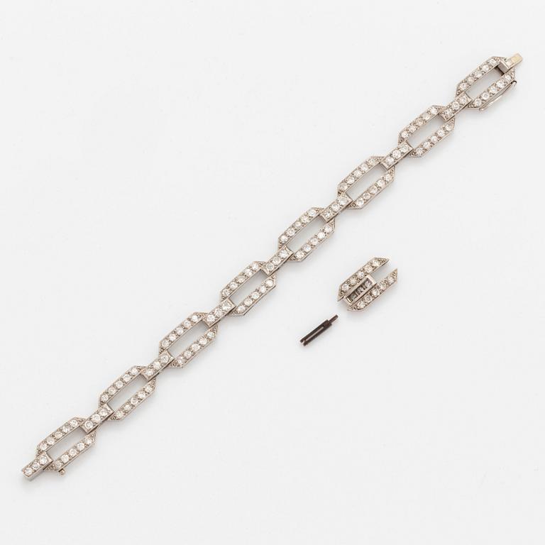 A platinum bracelet set with old-cut diamonds.