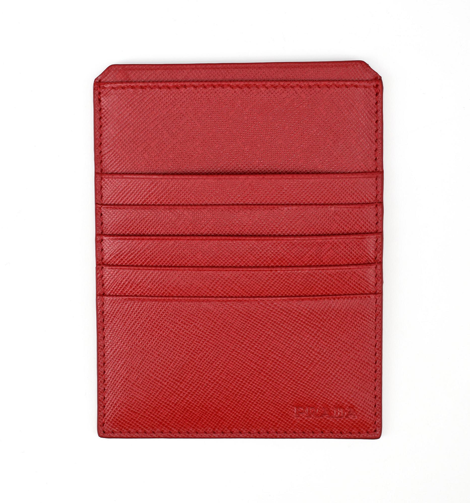PRADA, a red leather credit card holder.