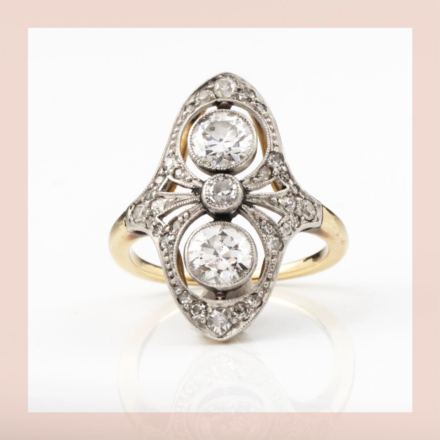 RING, 18k guld och platina, mille-griffes infattade gammalslipade diamanter totalt ca 1.15 ct. ca 1910. Vikt ca 4g.