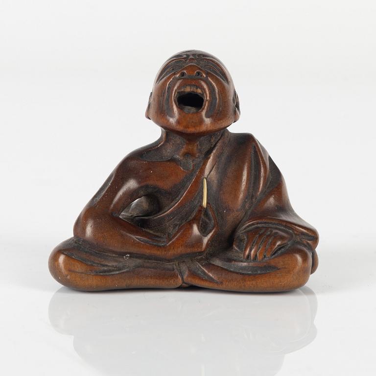 Netsuke, trä, Japan, signerad Gyokkō, 1800-talets senare del.