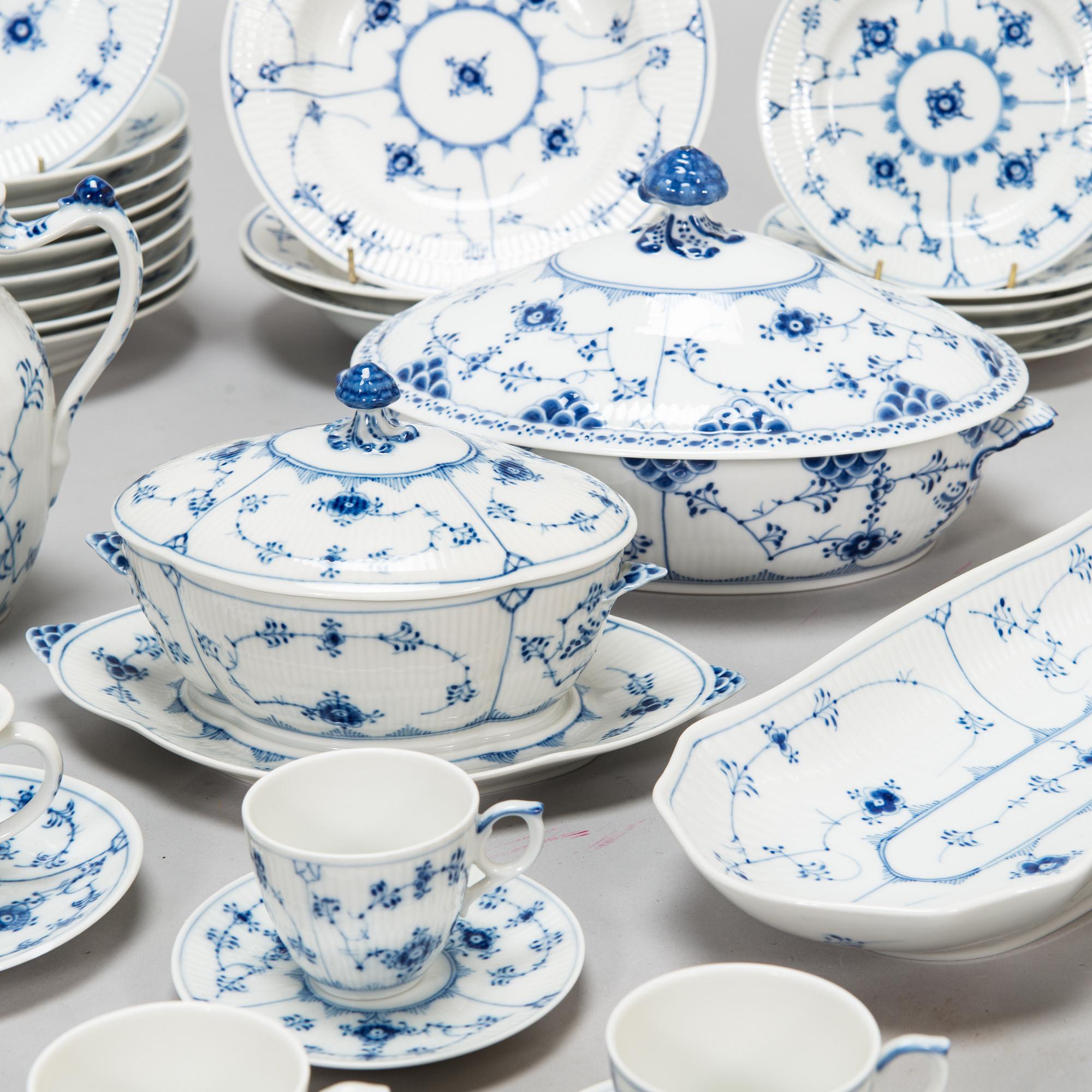A 73-piece 'Blue Fluted Plain' porcelain tableware set, Copenhagen, Denmark, mostly 1940s-60s.
