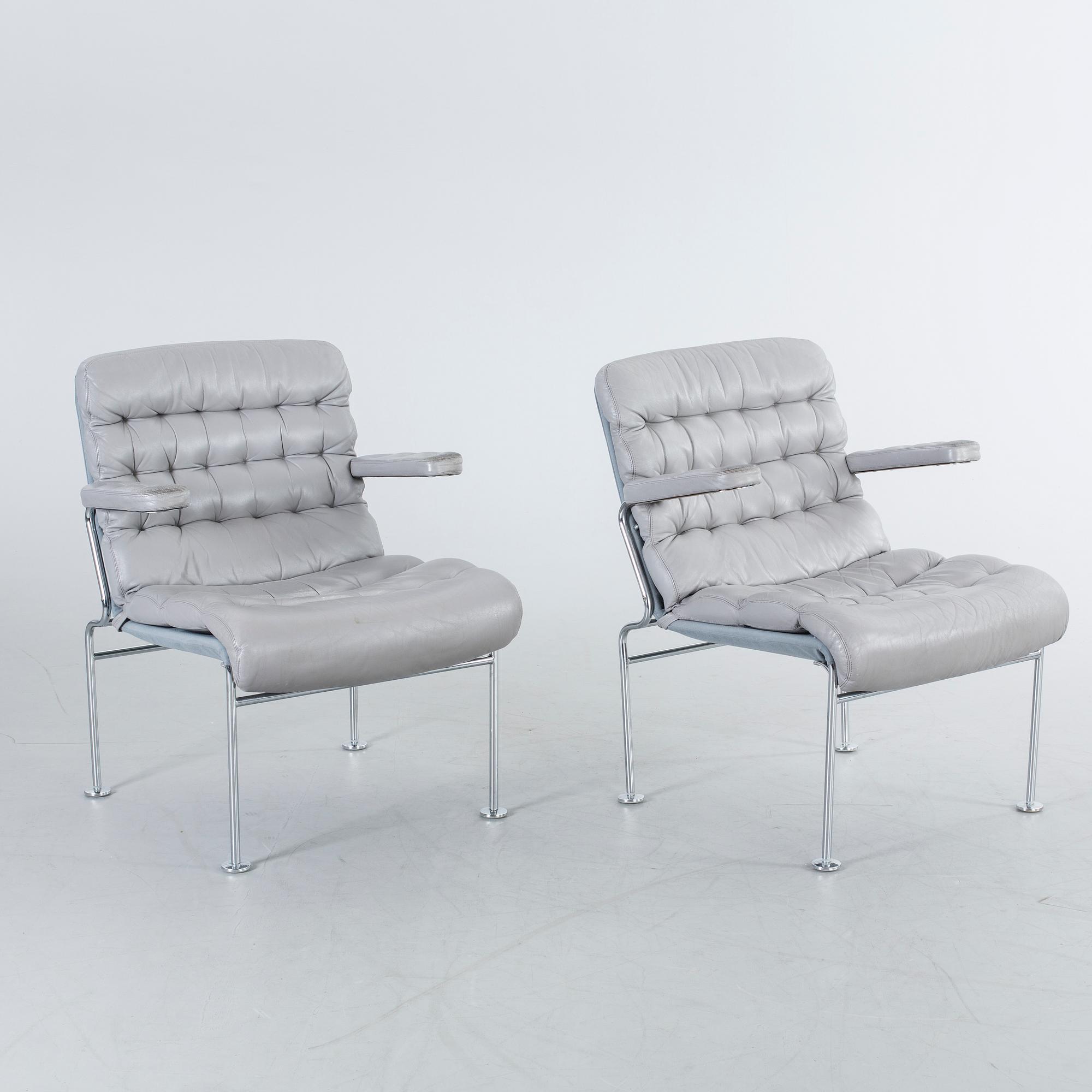 A COUPLE OF BRUNO MATHSSON ARMCHAIRS.