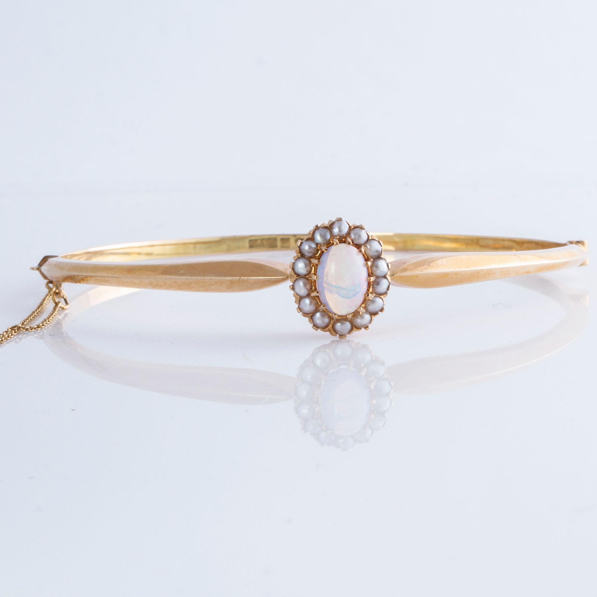 ARMRING, med opal och orientaliska pärlor, Gustav Dahlgren & Co, Malmö, 1917.