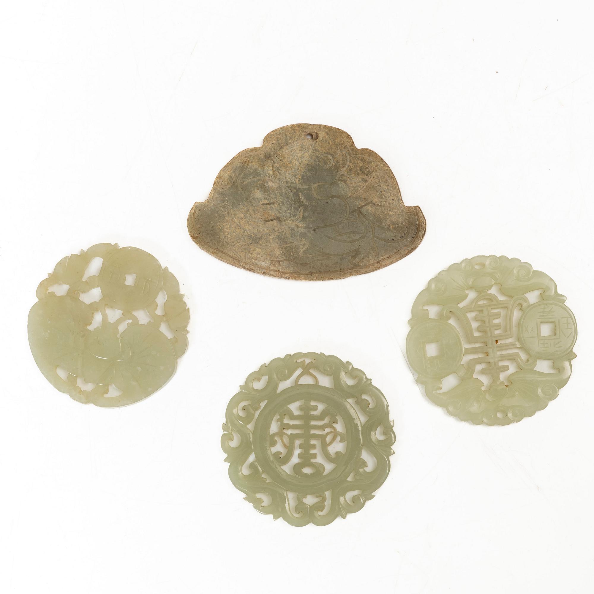 A group of four Chinese stone amulets / plaques, 20th century.