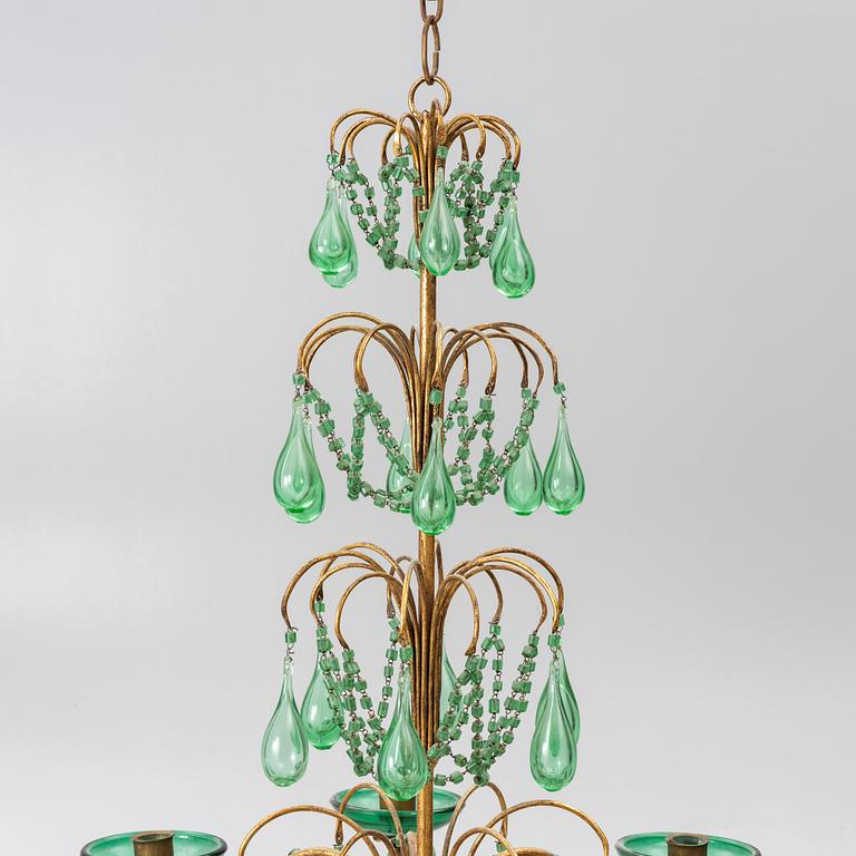 A chandelier, likely from Italy, circa 1950.