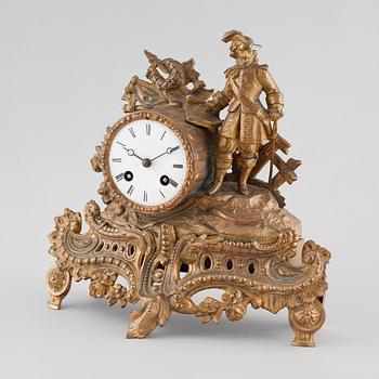 A Louis XV style table clock from P H Mourey, early 20th century.