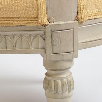 A matched pair of Gustavian armchairs, one signed by Johan Lindgren Stockholm.