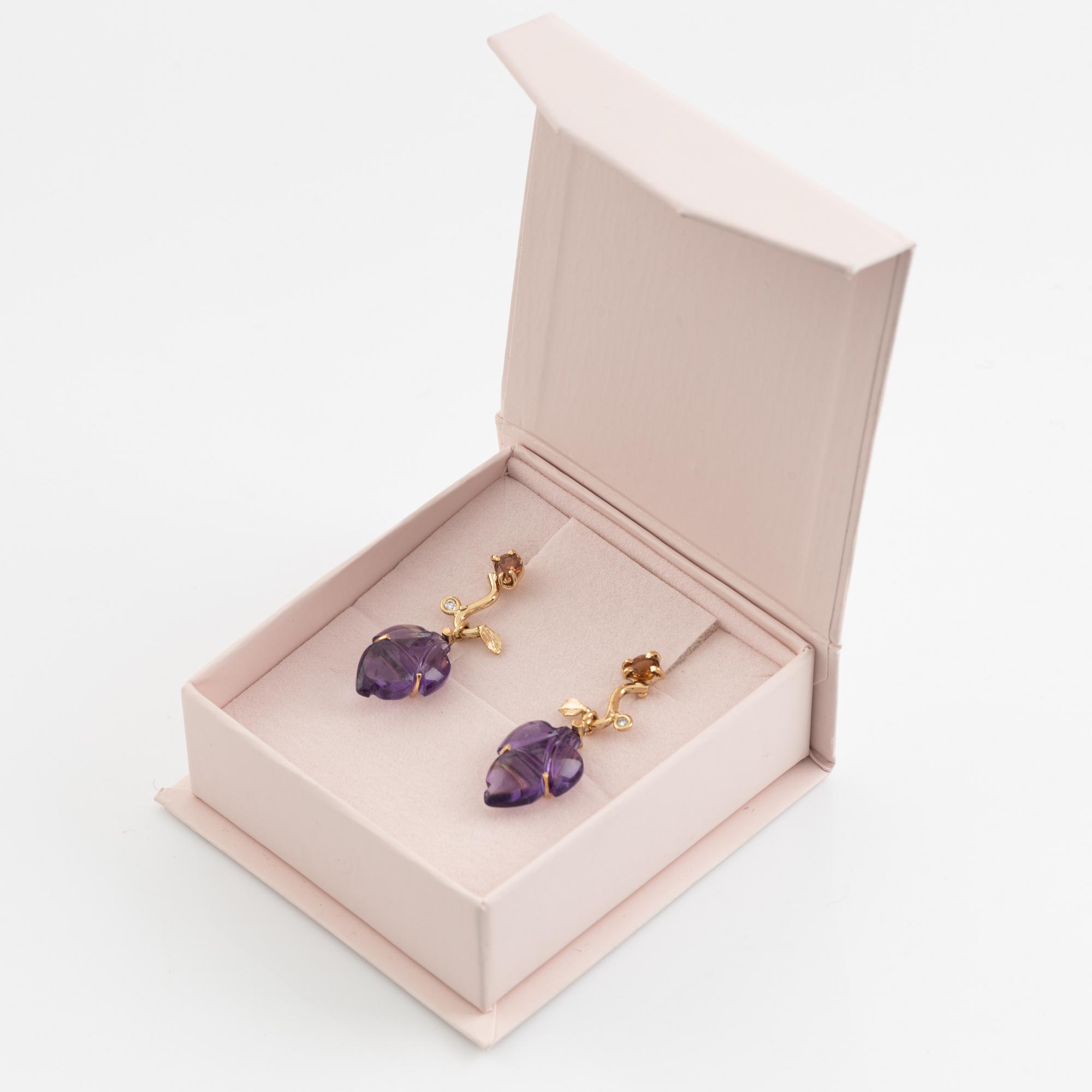Carved amethyst, tourmaline and brilliant cut diamond earrings.