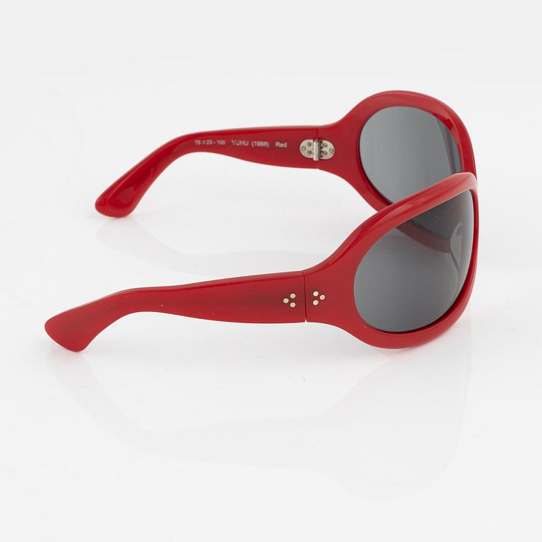 Oliver Goldsmith, a pair of red "Yuhu" sunglasses.