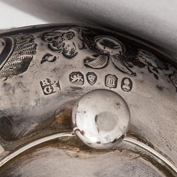 Two sterling silver milk jugs, London 1794 och 1828.