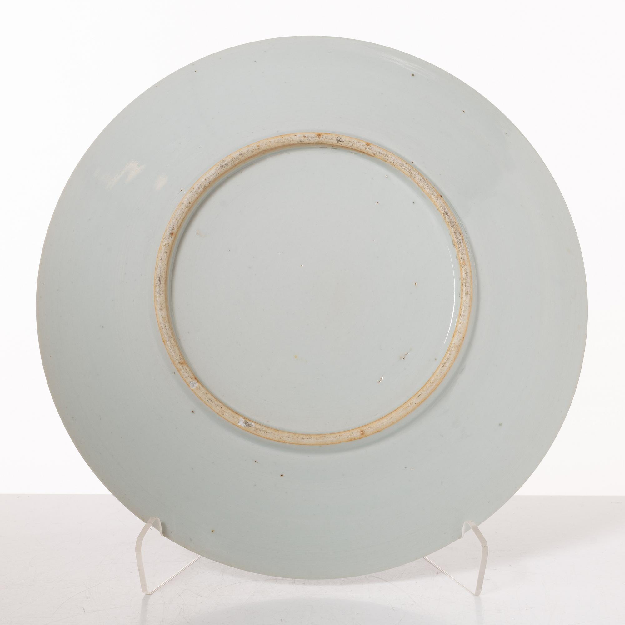 A group  of three serving dishes, a serving bowl, a cup, and seven plates, porcelain, including China 18th century.