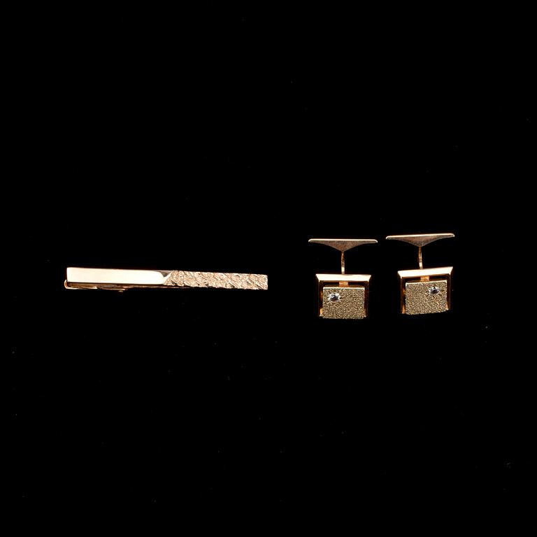 SLIPSNÅL och MANSCHETTKNAPPAR, guld 14K. Finska stämplar 1971 och 1995. Vikt. tot. 10 g.