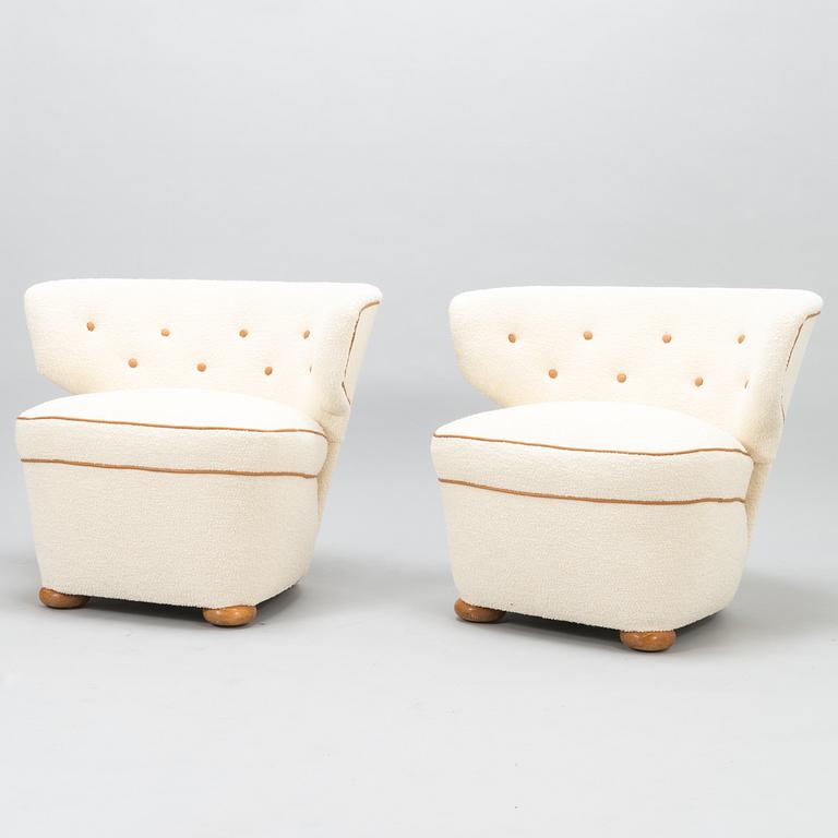 A pair of 1950's armchairs for Oy Pauk Boman Ab.