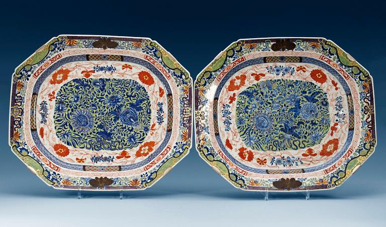 A pair of 'clobbered' blue and white serving dishes, Qing dynasty, Qianlong (1736-95). (2).