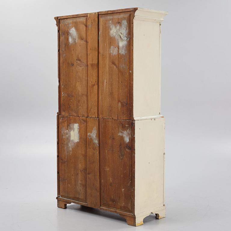 A 18th century panited cabinet.