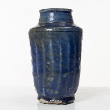 A Kashan pottery vase, central Persia 13th century.