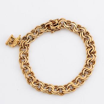 Bracelet with charm 18K gold.