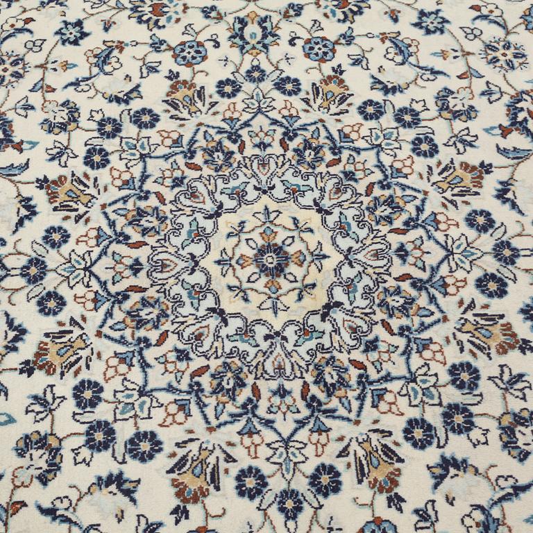 A Keshan rug, 295 x 200 cm.