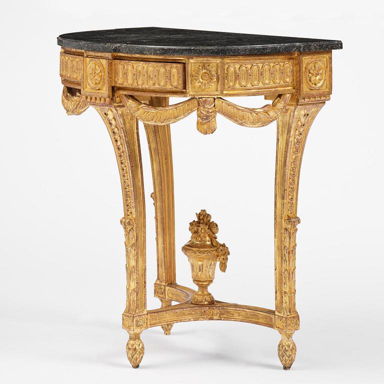 A Gustavian carved giltwood console table, Stockholm, late 18th century.