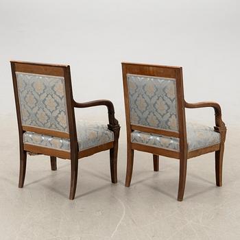 Armchairs, a pair in the Empire style, circa 1900.