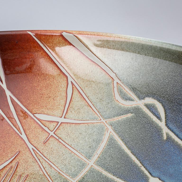 JACKIE LYND, a large stoneware dish, Rörstrand.