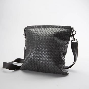 A Bottega Veneta leather messanger bag.